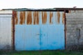 Big rusty door of a warehouse Royalty Free Stock Photo