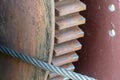 A big rusty pinion mechanism on the deck of an old ferry. Old rusty vintage mooring bollard for boats, ships and yachts. Control Royalty Free Stock Photo