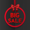 Big sale. Bright holiday round frame banner hanging with red ribbon and silky bow on dark background. Vector illustration Royalty Free Stock Photo