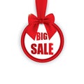 Big sale, round banner with red ribbon and bow, isolated on white background. Vector illustration. Royalty Free Stock Photo