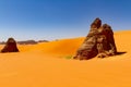 Sand dunes and rock towers of Tin Merzouga.   Tadrart mountains, Tassili n`Ajjer National Park, Algeria, Afrika Royalty Free Stock Photo