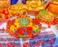 The scenic korovai bread decorated with colorful flowers and Tryzub, the coat of arms of Ukraine, Dnipro