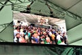 Big screen showing patriots waiting for the ceremony to begin