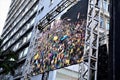 Big screen shows immensity of patriots in green and yellow on Paulista Royalty Free Stock Photo