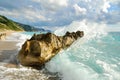 Big sea wave breaking on the beach rocks Royalty Free Stock Photo