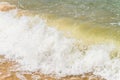 Big sea wave powerfully falls on the sandy coast Royalty Free Stock Photo