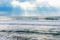 Big sea waves, big storm, weather elements on background of blue sky Royalty Free Stock Photo