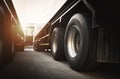 Big Semi Trailer Truck Wheels Tires. Rubber, Wheel Tyres. Trucks on Parking. Freight Trucks Transport Logistics Royalty Free Stock Photo