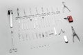 Medical instruments used for surgical operations, laid out on a gray background Royalty Free Stock Photo