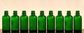 Big set of green empty bottles for herbal cosmetics Royalty Free Stock Photo