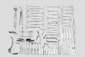 Medical instruments used for surgical operations, laid out on a gray background Royalty Free Stock Photo