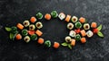 Big set of pieces of sushi rolls on black stone background. Top view. Royalty Free Stock Photo