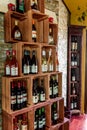 A big shelf with wine. Shelf with wine bottles. Royalty Free Stock Photo