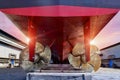 Propeller Close up and Repair Cargo ship in floating dry dock. Royalty Free Stock Photo