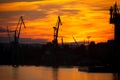 Big shipyard crane at sunset in Gdansk, Poland. Royalty Free Stock Photo