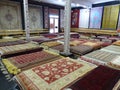 Big shop full of handmade carpets in Uzbekistan.