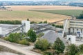 Big silos, belt conveyors and mining equipment in a quarry. Quarrying of stones for construction works. Mining industry in quarry. Royalty Free Stock Photo