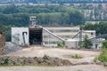 Big silos, belt conveyors and mining equipment in a quarry. Royalty Free Stock Photo