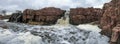 The Big Sioux River flows over rocks in Sioux Falls South Dakota with views of wildlife, ruins, park paths, train track bridge, tr