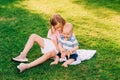 Big sister playing with adorable baby brother Royalty Free Stock Photo