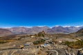 Big Sitting Buddha Statue at Diskit Monastery with Himalaya Range in the back - Nubra Valley, India. Royalty Free Stock Photo