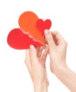 Big and small broken hearts in woman's hands Royalty Free Stock Photo