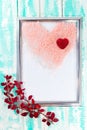 Big and small hearts on white sheet for text in frame with branch of burgundy barberry. Pink sea salt on blue wooden sea boards Royalty Free Stock Photo