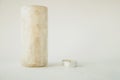 Big and small white candles are on the table Royalty Free Stock Photo