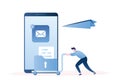 Big smartphone with mail application and man rolls the cart with document and paper plane flying Royalty Free Stock Photo