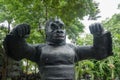 Big smiling King Kong statue in outdoor forest park Royalty Free Stock Photo