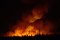 Big smoke from the burning sugarcane fields at night. Royalty Free Stock Photo
