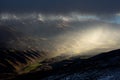 Big snowy mountains covered in the dark stormy clouds in Cardrona Valley Wanaka New Zealand Royalty Free Stock Photo