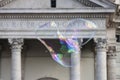 Big soap bubbles in front of the church Santa Maria