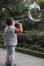 boy blowing soapbubble Royalty Free Stock Photo