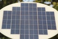 Big solar panel in the street on the blurred background during the daytime Royalty Free Stock Photo
