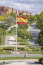 Big Spain waving flag on Paracuellos de Jarama , Madrid. Flag symbols of Spain