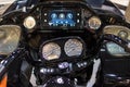 The steering wheel of the modern CVO Harley Davidson motorcycle.