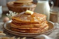 Big stack of homemade crepes or thin crepes with butter in rustic style Royalty Free Stock Photo