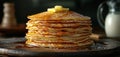 Big stack of homemade crepes or thin crepes with butter in rustic style Royalty Free Stock Photo