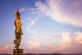 Big standing Buddha statue and the sky at sunset Royalty Free Stock Photo