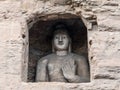 Big Standing statue of Amitabha Buddha in Cave 19 at Yungang Grottoes Royalty Free Stock Photo