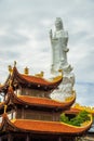 big statue of guanyin bodhisattva on mount in Ho Quoc pagoda (Vietnamese name is Truc Lam Thien Vien) with , Phu Quoc island,