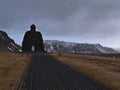 Big statue made of volcanic rocks with relation to the BÃÂ¡rÃÂ°ar saga SnÃÂ¦fellsÃÂ¡ss in small village Arnarstapi in winter.