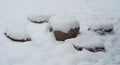 Big stones are covered with snow Royalty Free Stock Photo