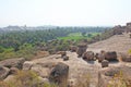 Big stones in Hampi, Karnataka, India. Beautiful green valley of rice fields and palm trees Royalty Free Stock Photo