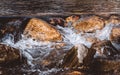 Big stones in mountain stream in autumn Royalty Free Stock Photo