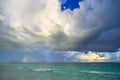 Big storm clouds in sky above blue sea Royalty Free Stock Photo