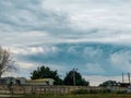 A big storm is coming over the city. Round cyclone. State of the sky before the hurricane Royalty Free Stock Photo
