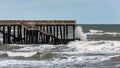 Big stormy waves crash on the pier Royalty Free Stock Photo