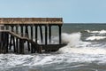 Big stormy waves crash on the pier Royalty Free Stock Photo